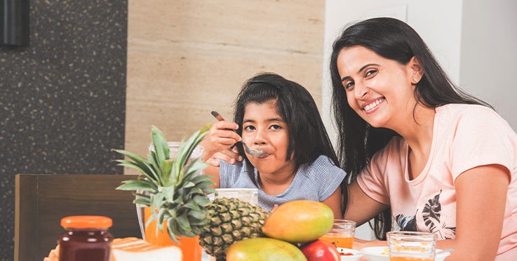 Mother Daughter Having Breakfast