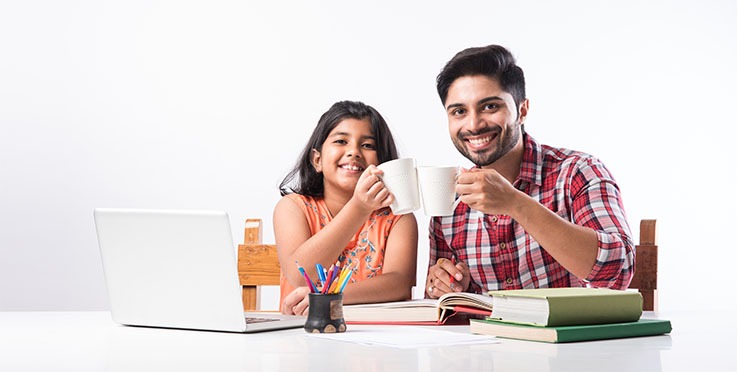 Father and daughter Toasting with tea cup