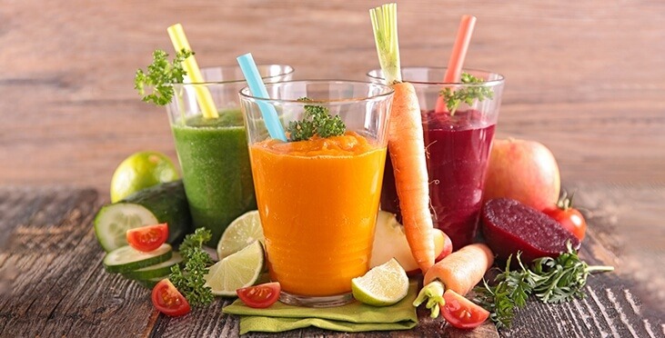 Three glasses of fruit and vegetable juice